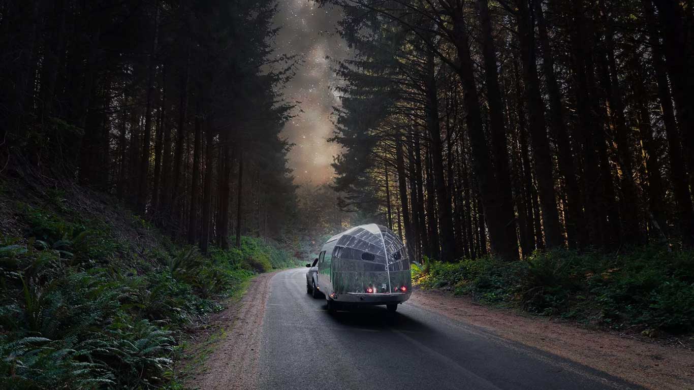 camper caravan on back of car.